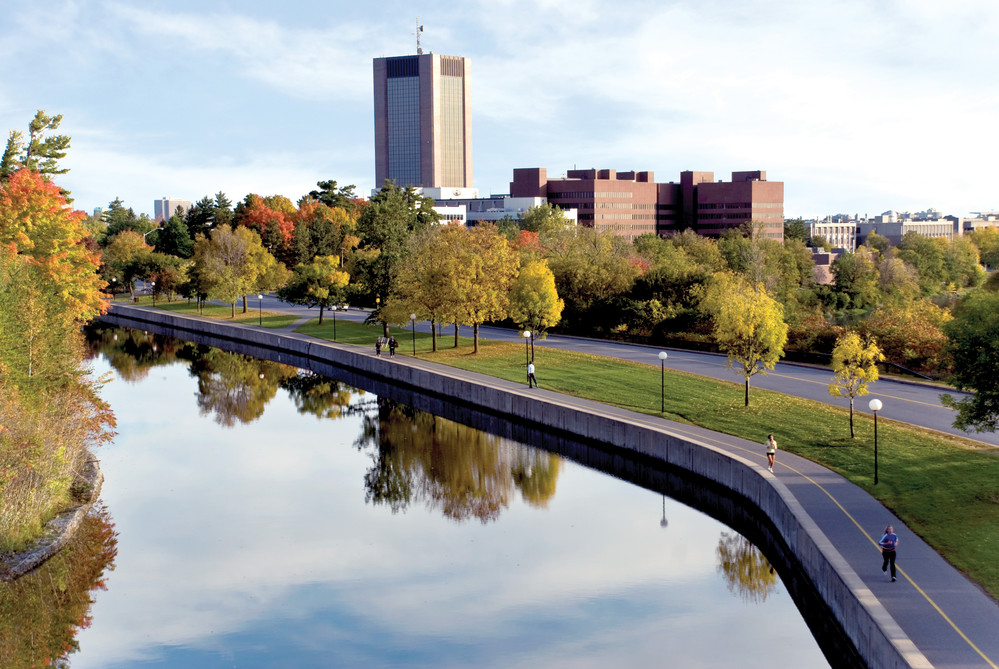 Campus buildings near bike path and canal